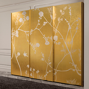 _Sesamo wardrobe 
                 3 sliding doors in wood, gold leaf finish 
                 cat.C, with Chanel decoration.